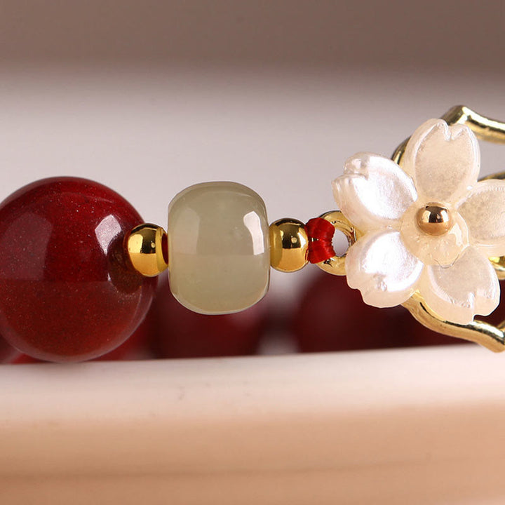 Pulsera de bendición de flores de piedra Tridacna con cuentas de jade cinabrio Natural de Buddha Stones