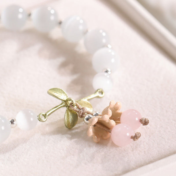Pulsera con dije de orquídea de la paz, cristal rosa, calcedonia azul, aventurina verde, ojo de gato , Buddha Stones
