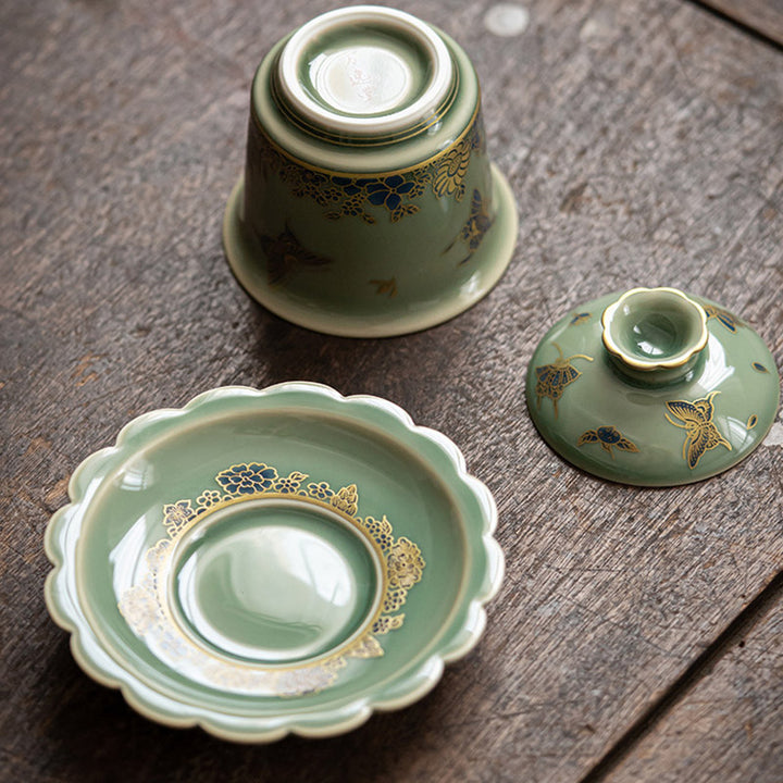 Buddha Stones de porcelana verde, mariposa, flor, salmón, pescado, cerámica, Gaiwan Sancai, taza de té de Kung Fu y platillo con tapa