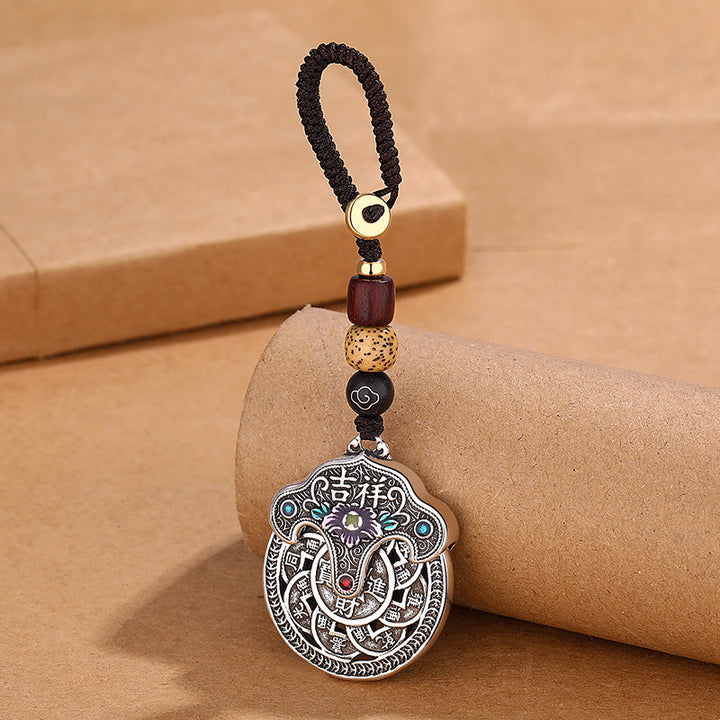 Llavero de riqueza auspiciosa con moneda de cobre y flor de peonía con Buddha Stones