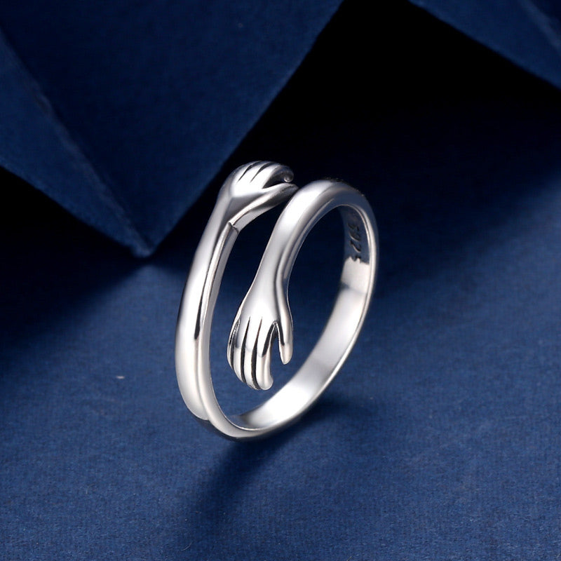 Anillo para pulgar con abrazo de amor en plata de ley 925 con Buddha Stones