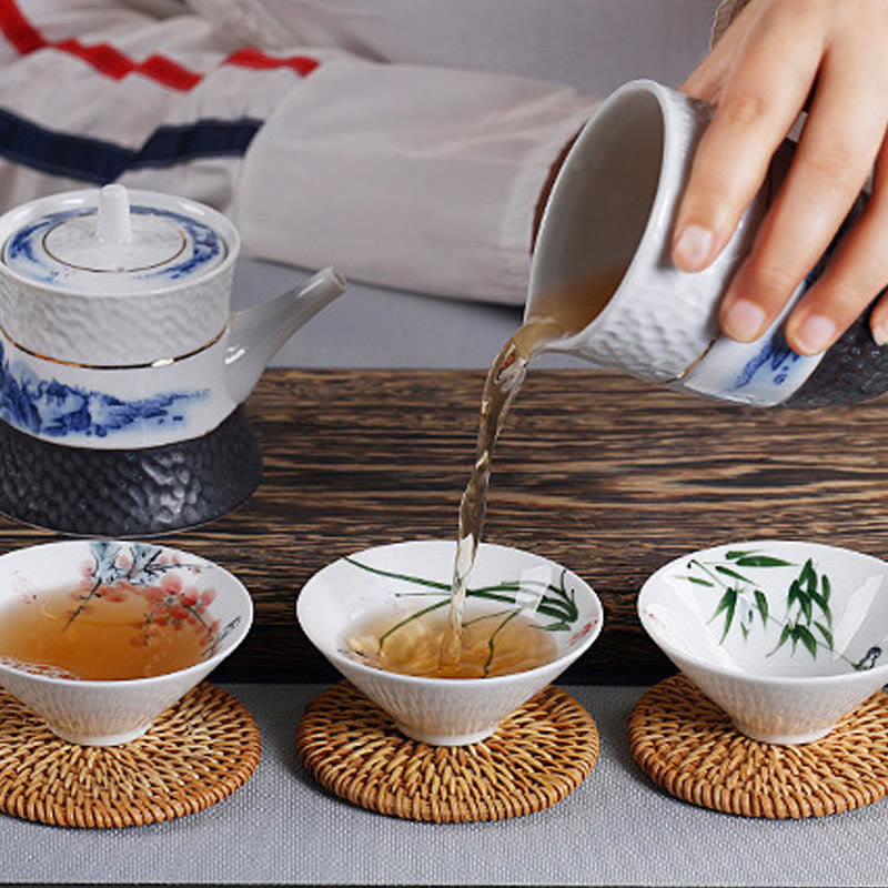 Buddha Stones Vintage ciruela orquídea bambú crisantemo loto pez Koi taza de té de cerámica tazas de té Kung Fu