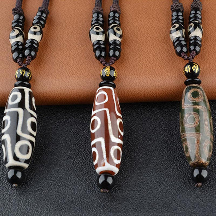 Collar de protección de la riqueza con cuentas Dzi de nueve ojos y Buddha Stones