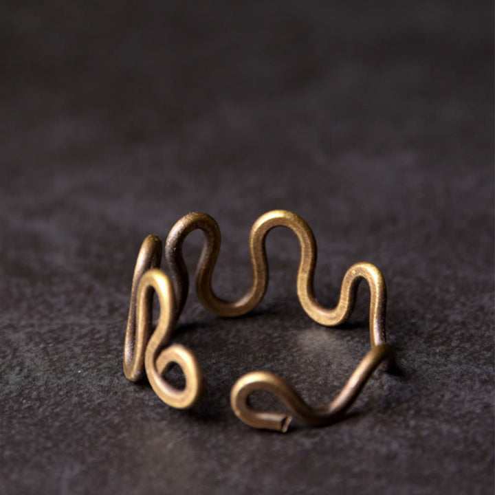 Anillo ajustable de cobre con diseño de latón curvado simple con Buddha Stones