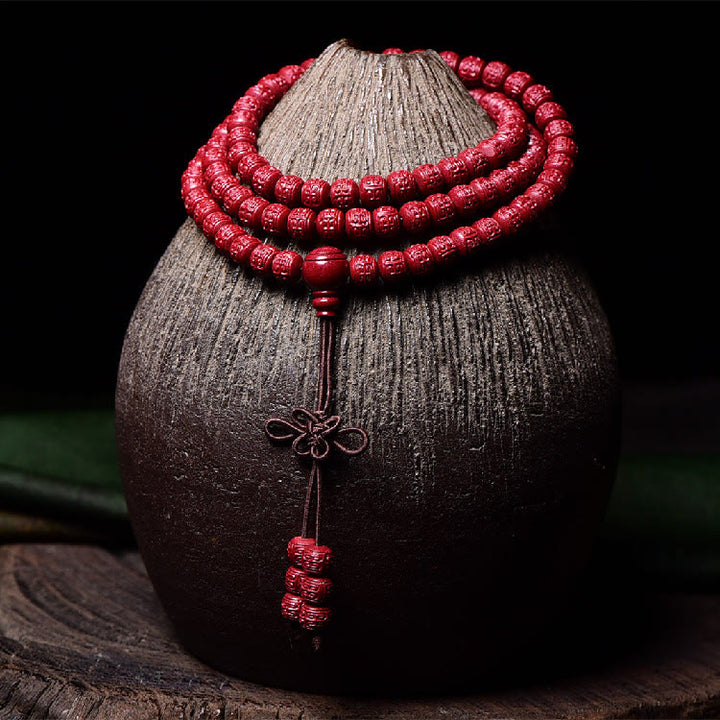 Buddha Stones 108 cuentas Mala cinabrio Om Mani Padme Hum patrón grabado pulsera de bendición