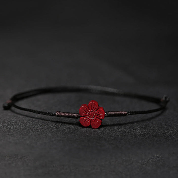 Pulsera trenzada hecha a mano con Buddha Stones, flor de ciruelo, trébol de cuatro hojas, PiXiu, loto, pez Koi, cinabrio