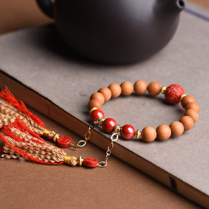 Pulsera de borlas de riqueza PiXiu de cinabrio de madera de melocotón Natural tibetana con Buddha Stones