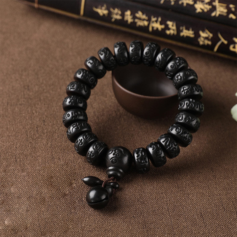 Pulsera de protección de madera con relámpago tibetano de Buddha Stones