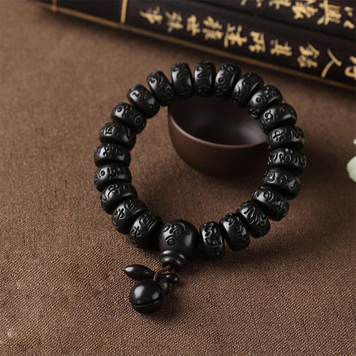 Pulsera de protección de madera con relámpago tibetano de Buddha Stones