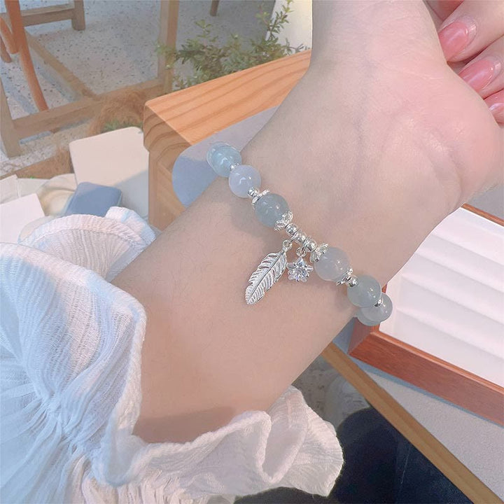Pulsera con dije de estrella y plumas curativas de ojo de gato, aguamarina, plata de ley 925 con Buddha Stones
