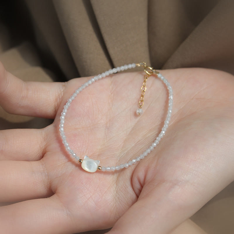 Pulsera curativa de piedra Tridacna de gato lindo de cristal blanco de espinela negra chapada en oro de 14 quilates con Buddha Stones - image 12