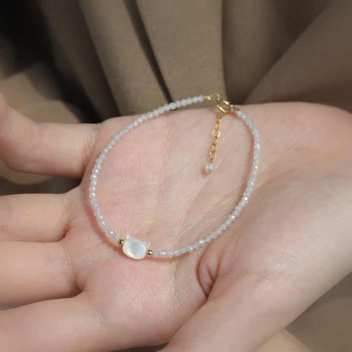Pulsera curativa de piedra Tridacna de gato lindo de cristal blanco de espinela negra chapada en oro de 14 quilates con Buddha Stones - image 12