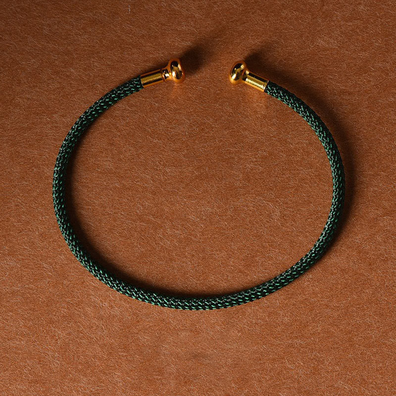 Pulsera de cuerda trenzada de la suerte hecha a mano con diseño simple de Buddha Stones