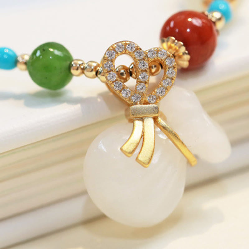 Pulsera de bendición para bolsa de dinero chapada en oro de 14 quilates con jade blanco hetiano natural con Buddha Stones