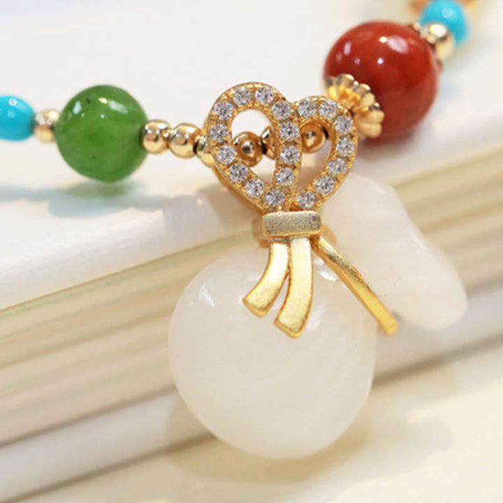 Pulsera de bendición para bolsa de dinero chapada en oro de 14 quilates con jade blanco hetiano natural con Buddha Stones