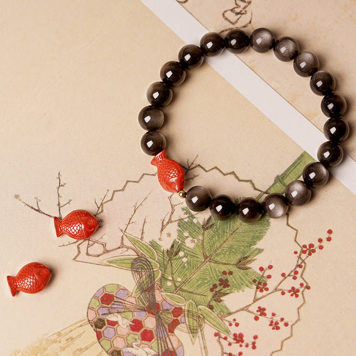 Pulsera de protección calmante con Buddha Stones , obsidiana con brillo de plata natural, cinabrio, pez Koi