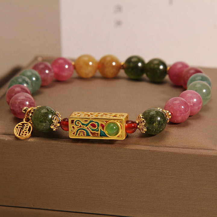 Pulsera con dije de personaje Fu positivo de turmalina colorida con Buddha Stones