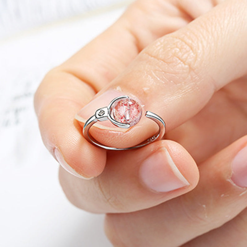 Anillo de rotación calmante de cristal rosa con Buddha Stones