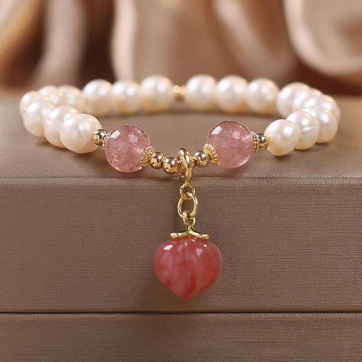 Pulsera con dije de sabiduría de corazón de amor de melocotón de cuarzo de fresa de perlas naturales de Buddha Stones