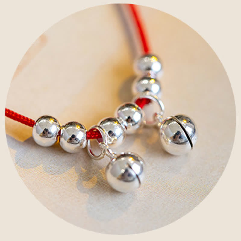 Tobillera con dije de campana trenzada con hilo rojo de plata de ley 925 con Buddha Stones