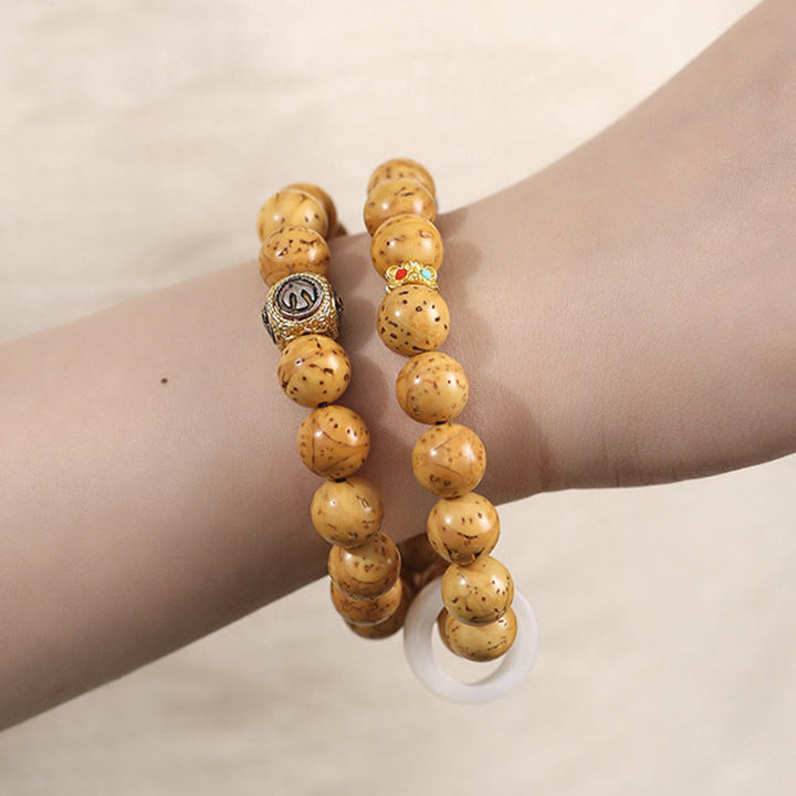 Pulsera de doble envoltura con Buddha Stones tibetanas, oro púrpura Natural, rata, Bodhi, semilla, riqueza