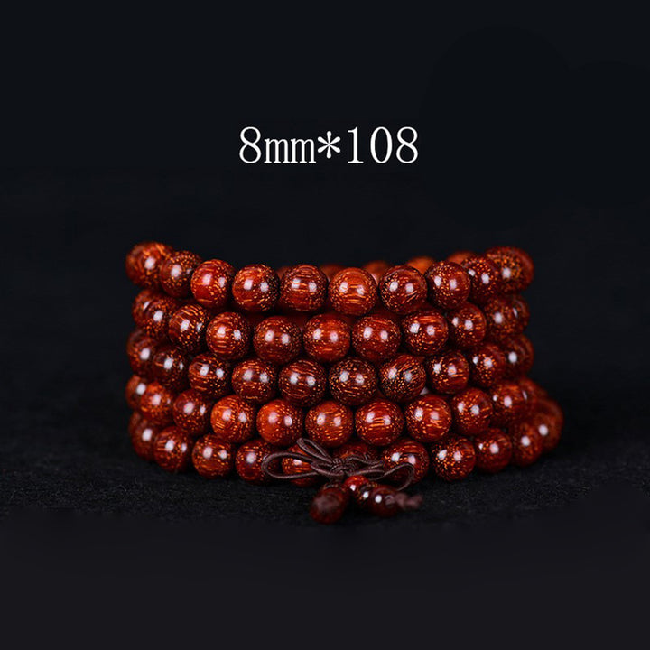 Pulsera de equilibrio de sándalo rojo con hoja pequeña tibetana de Buddha Stones