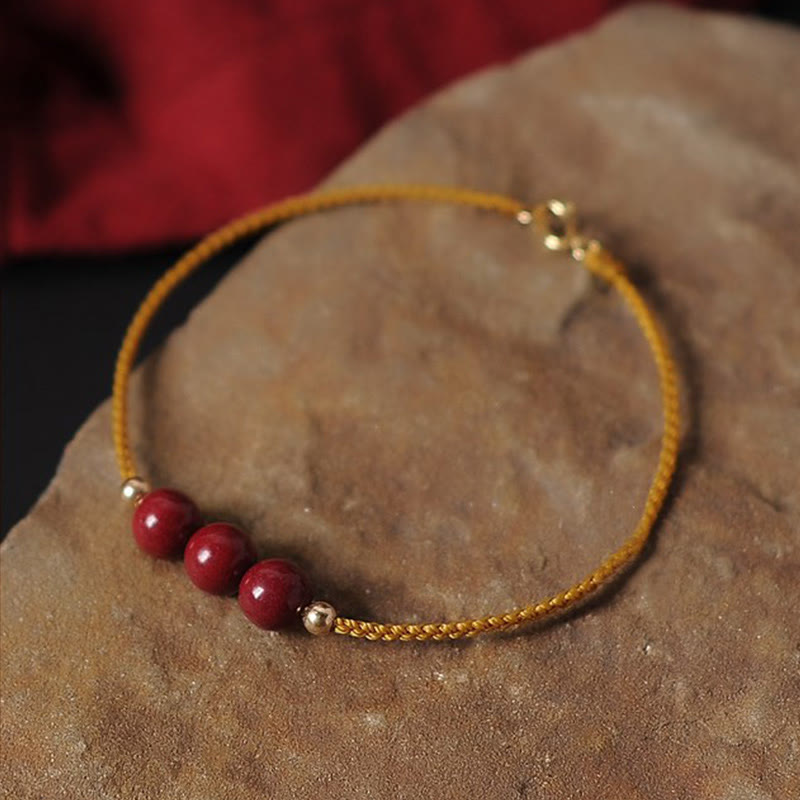 Pulsera trenzada con cadena de bendición de cinabrio natural chapada en oro de 14 quilates con Buddha Stones