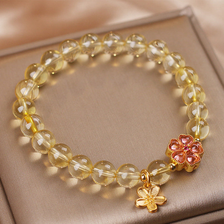 Pulsera de protección de prosperidad con dije de flor de citrino natural con Buddha Stones