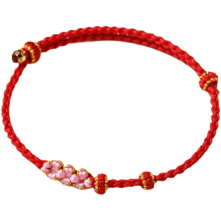Pulsera de cuerda trenzada con protección de flor de melocotón hecha a mano con Buddha Stones