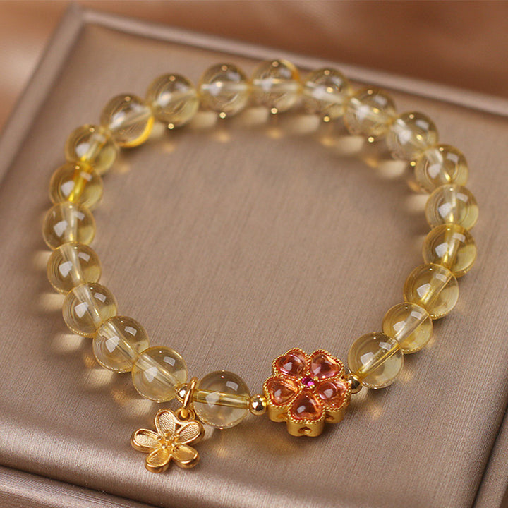 Pulsera de protección de prosperidad con dije de flor de citrino natural con Buddha Stones