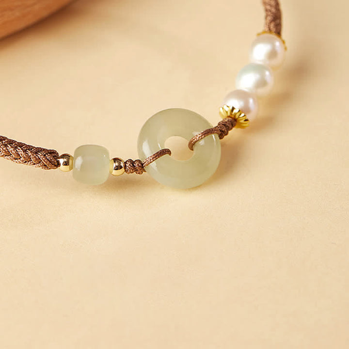 Pulsera de la suerte con hebilla de la paz y perlas de jade hetiano natural de Buddha Stones