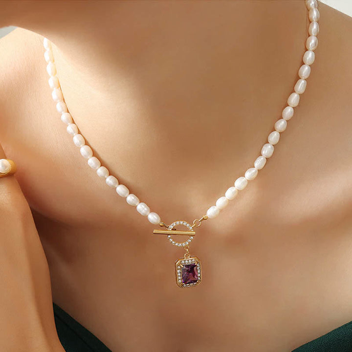 Colgante de collar con dije de riqueza de circonitas y perlas