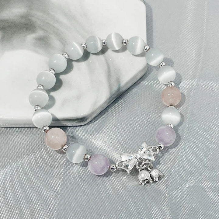 Pulsera con dije de roseta y amatista, lavanda, ojo de gato , Buddha Stones