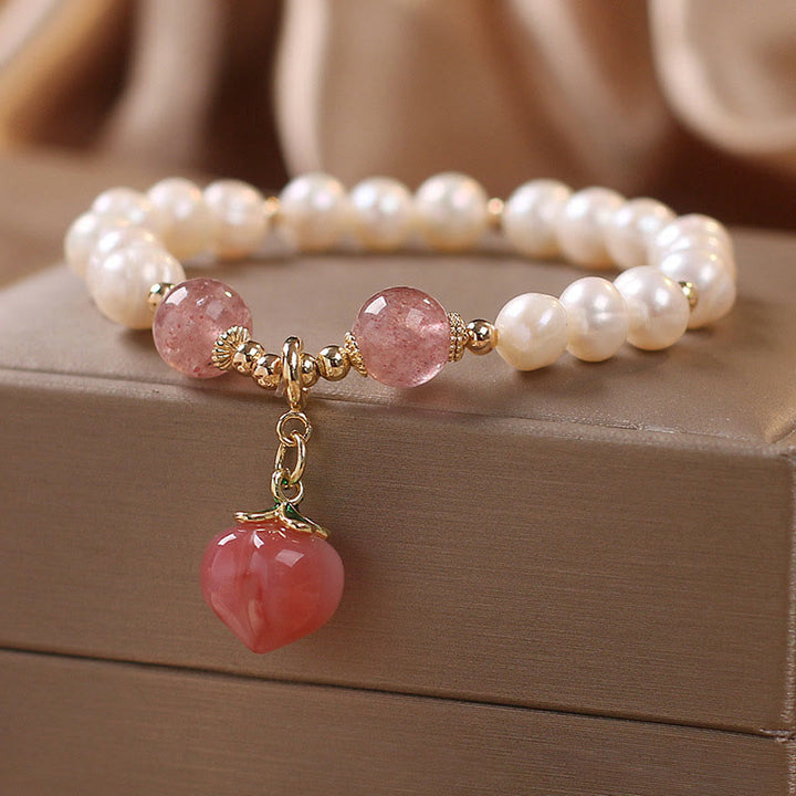 Pulsera con dije de sabiduría de corazón de amor de melocotón de cuarzo de fresa de perlas naturales de Buddha Stones