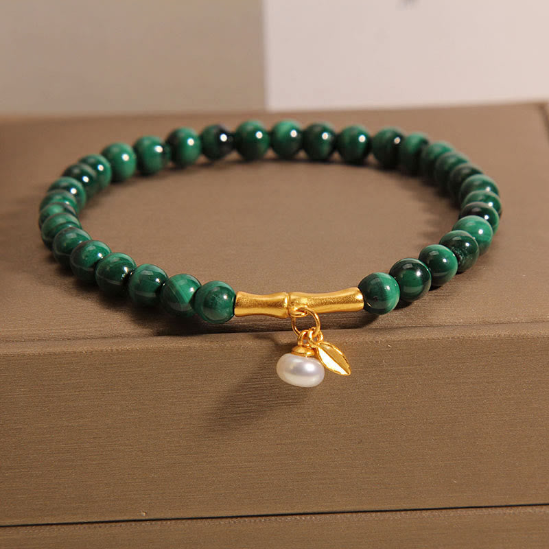Pulsera antiansiedad de bambú de la suerte con perlas de malaquita natural de Buddha Stones
