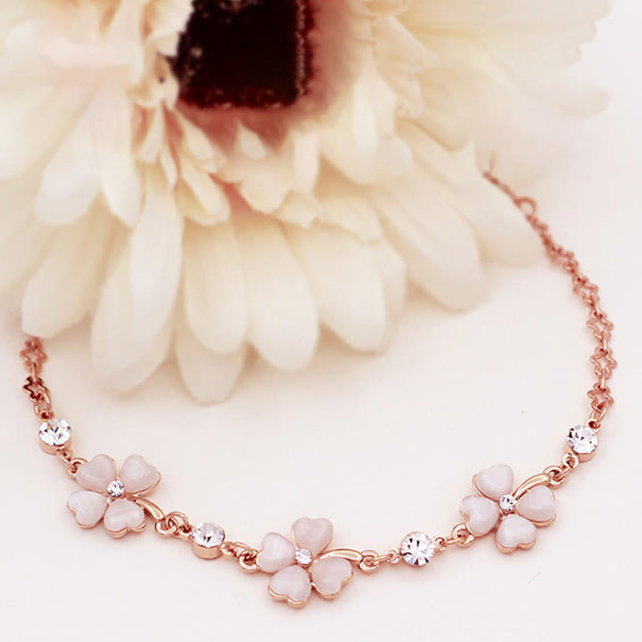 Pulsera de cadena de amor con trébol de cuatro hojas y cristal rosa con Buddha Stones