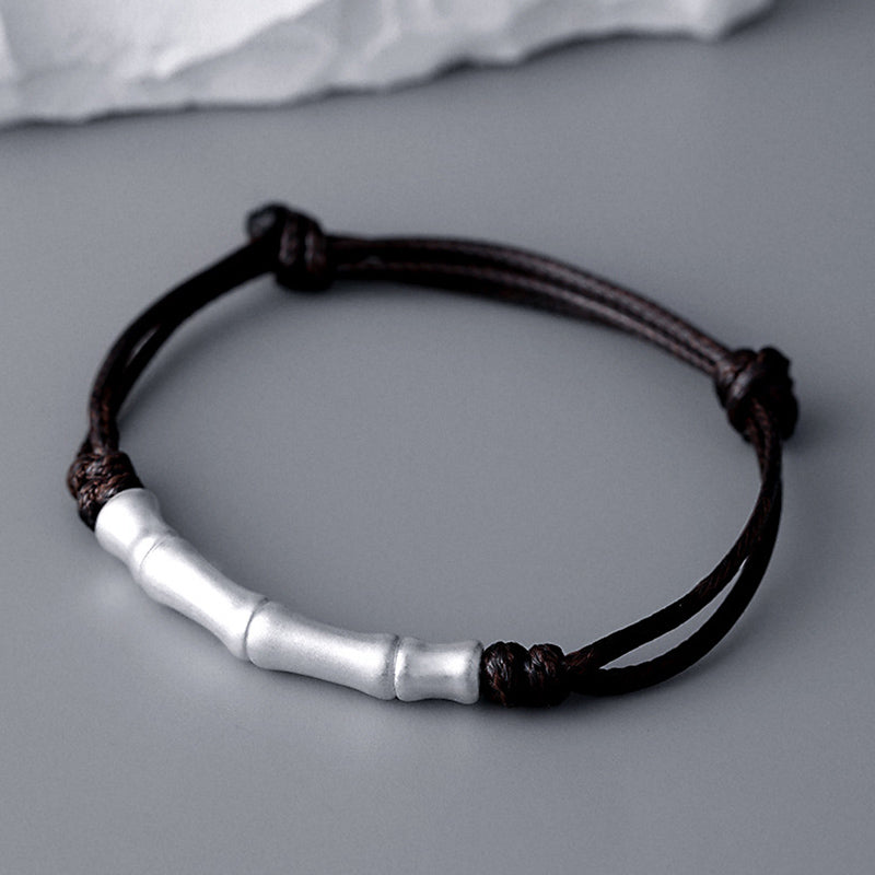 Pulsera trenzada de cuerda de la suerte con patrón de hueso de plata de ley 999 con Buddha Stones