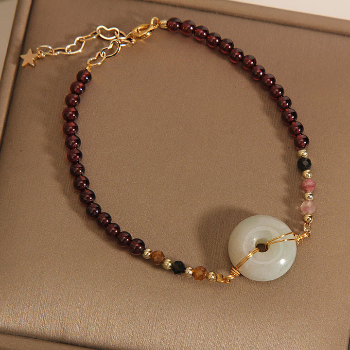 Pulsera de protección con hebilla de paz con cuentas de jade granate y Buddha Stones