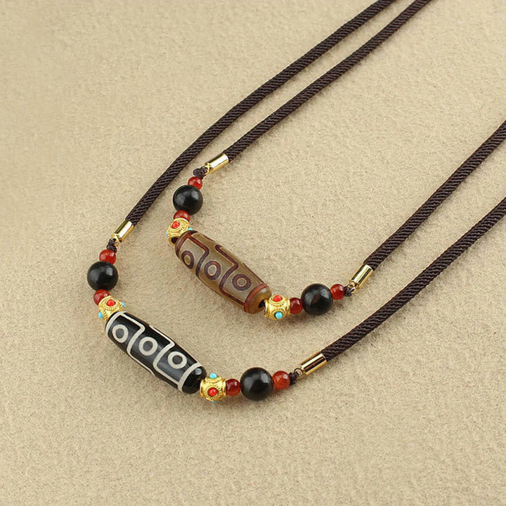 Colgante de collar de cadena con Buddha Stones tibetanas de nueve ojos Dzi, protección de cuentas, bendiciones