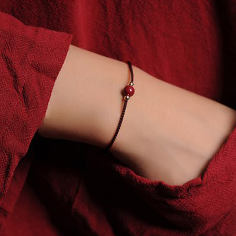 Pulsera trenzada con cadena de bendición de cinabrio natural chapada en oro de 14 quilates con Buddha Stones