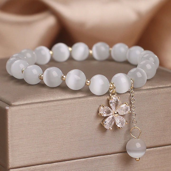 Pulsera de apoyo a la paz con dije de flor de ojo de gato y Buddha Stones