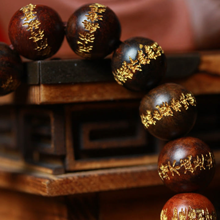 Pulsera de curación grabada con sutra de corazón de palisandro tibetano