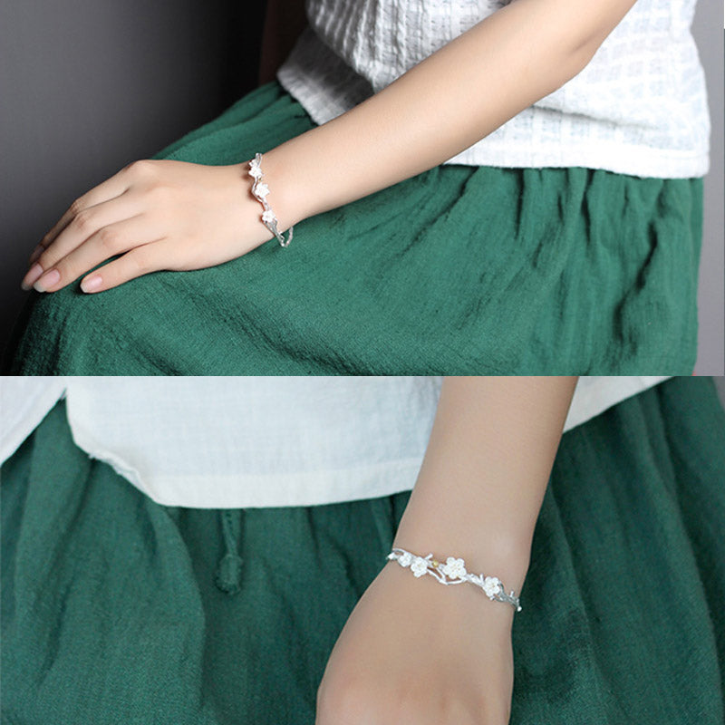 Pulsera ajustable con Buddha Stones de plata de ley 925 con flor de ciruelo y bendición