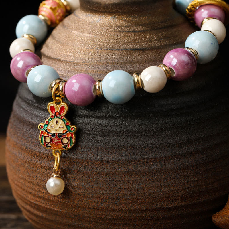 Buddha Stones tibetano Zakiram diosa de la riqueza conejo cabeza de león encanto Liuli vidrio incienso ceniza porcelana cuentas pulsera de protección
