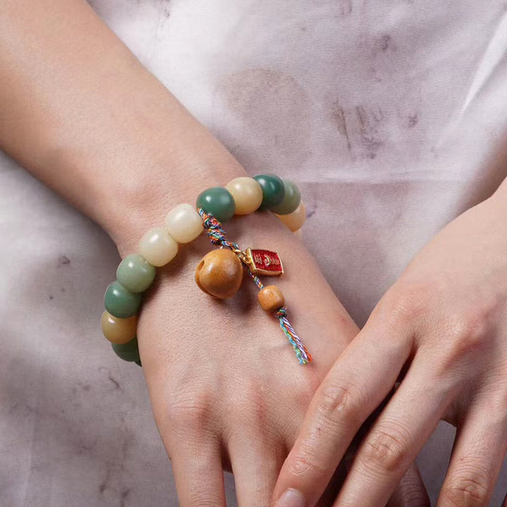 Pulsera con dije de tambor de pez de madera con semillas de Bodhi, gradiente Natural, Buddha Stones