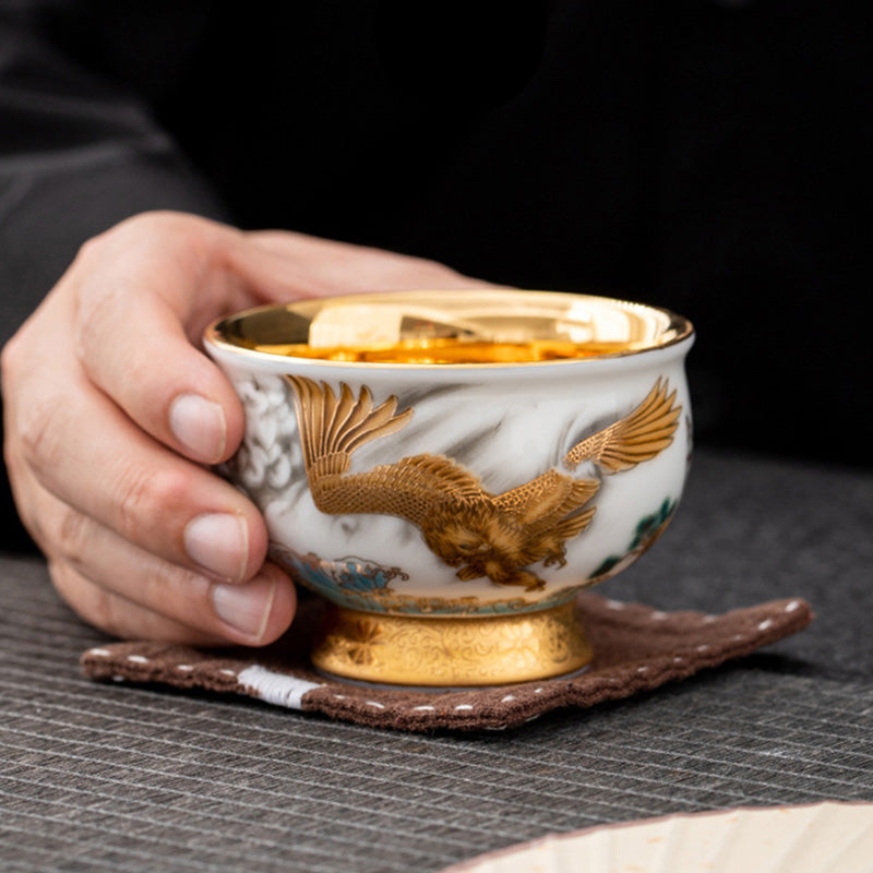 Taza de té de cerámica dorada con Buddha Stones, águila dorada, dragón auspicioso, sol, olas del océano, taza de té de Kung Fu