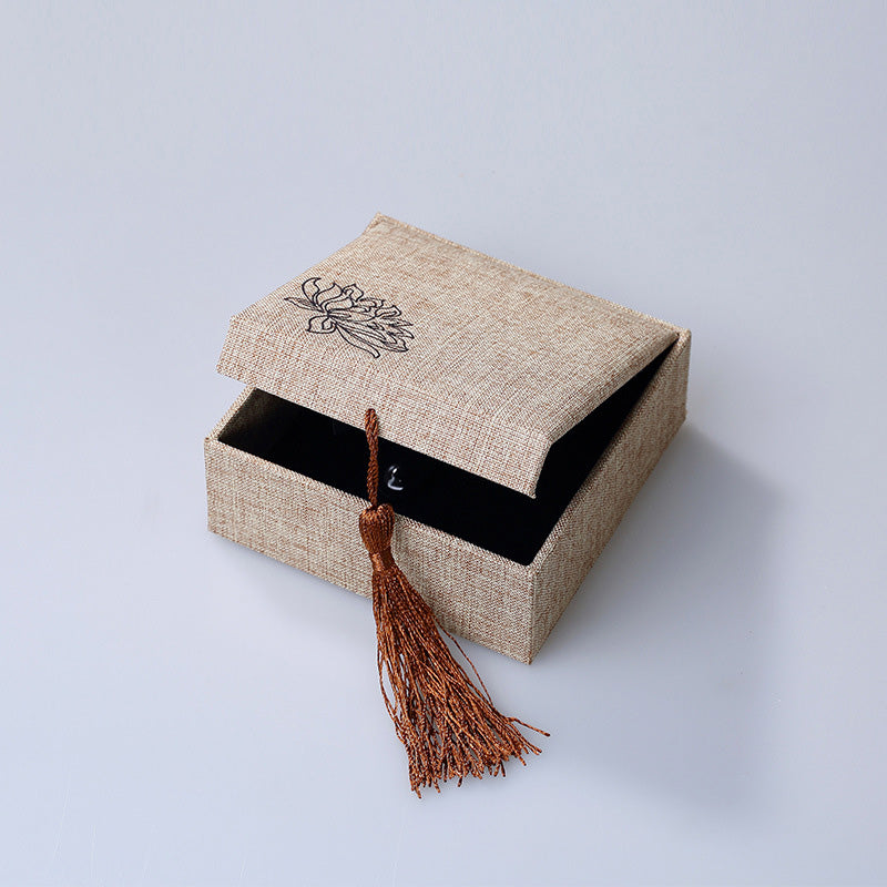Caja de almacenamiento de joyería con diseño de loto y Buddha Stones, caja de regalo con borlas