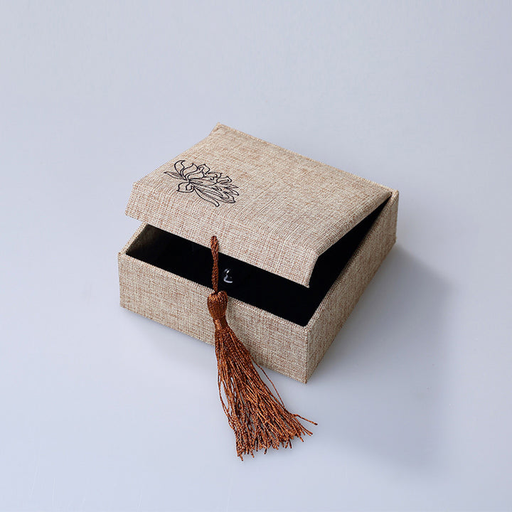 Caja de almacenamiento de joyería con diseño de loto y Buddha Stones, caja de regalo con borlas