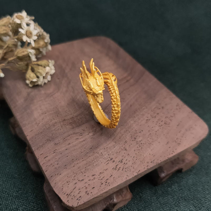 Anillo de fuerza de éxito del dragón dorado de Buddha Stones