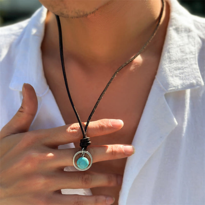 Colgante de collar de fuerza de protección de piedra turquesa redonda de Buddha Stones